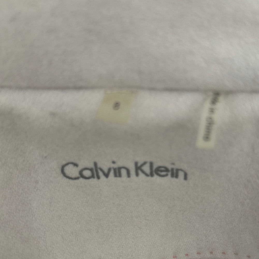 Calvin Klein size 8, cream colored pea coat.